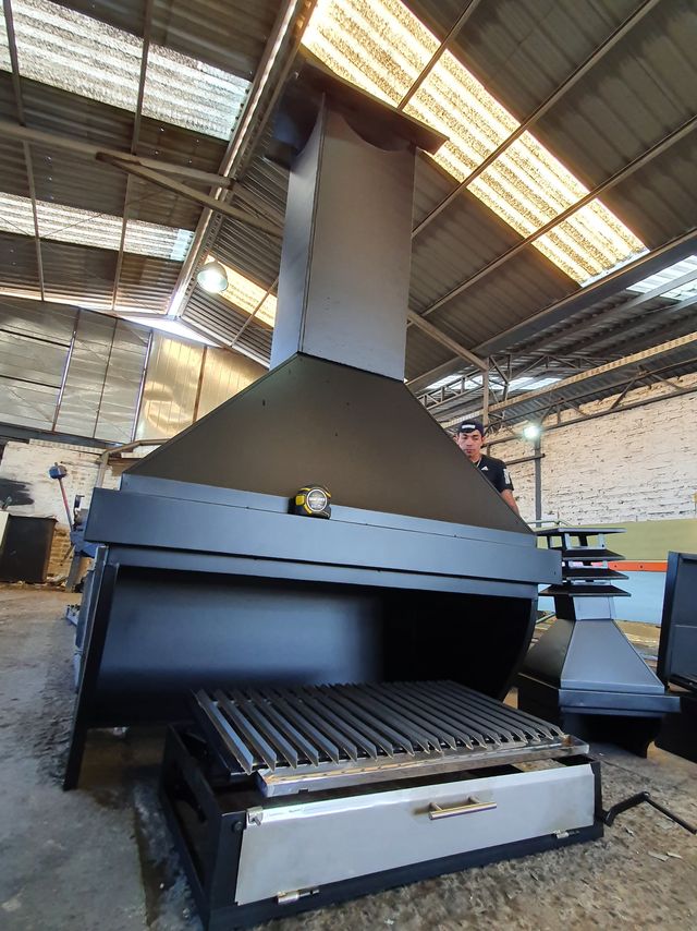 Campana con cinturón terminada en el taller, con parrilla abatible